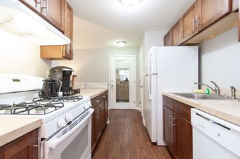 Upgraded Appliances and Hardware in Kitchen